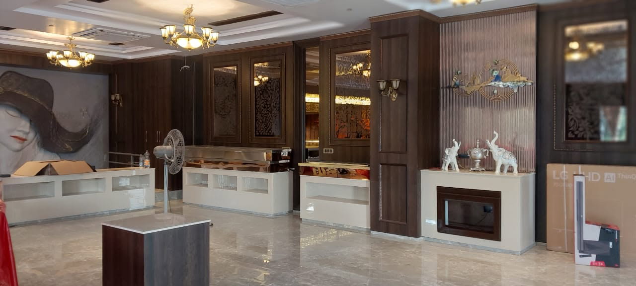 Warm living room with neutral palette and layered lighting