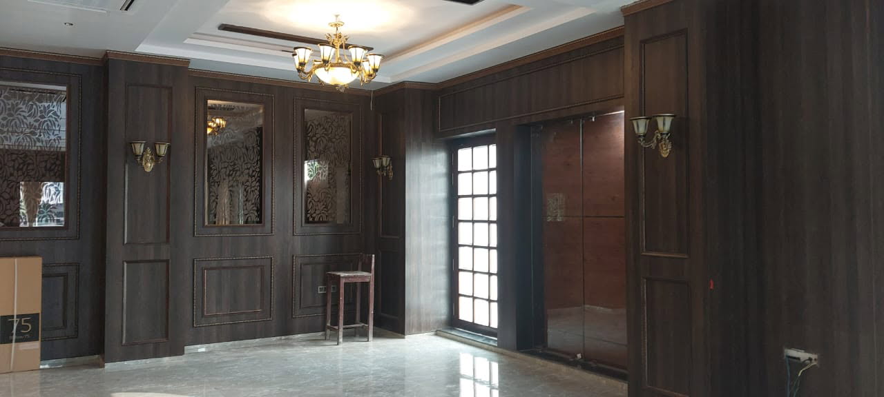 Bedroom with textured headboard and soft lighting